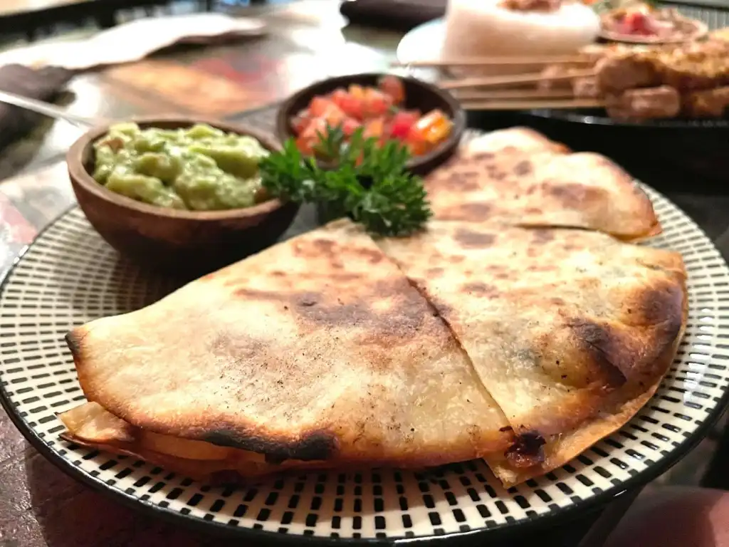 Midweek in Ubud dining with taco and vibrant Mexican flavors on patterned plate