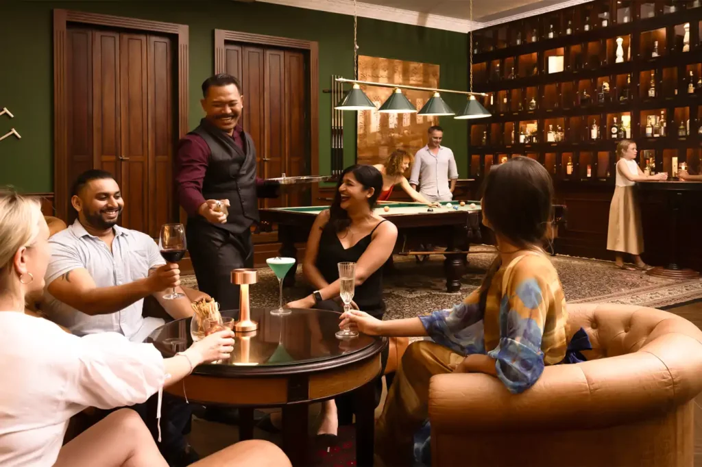 Cocktail bar Ubud with guests enjoying drinks in elegant lounge